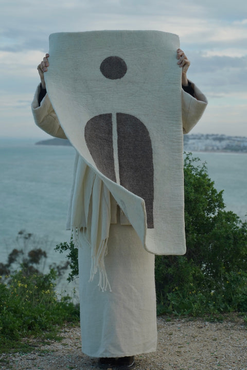 Handmade textile by the water
